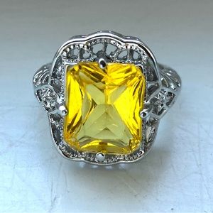 Prong set zircon citrine princess cut glass stone encased in faux silver! size 8